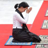 Myanmar State Counselor Aung San Suu Kyi attends an event marking the 70th anniversary of Martyrs’ Day at the Martyrs’ Mausoleum dedicated to the fallen independence heroes, including her father, Gen. Aung San, in Yangon on Wednesday. U.S. presses Myanmar to cease military ties with North Korea