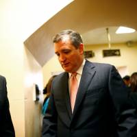 Sen. Ted Cruz arrives for a health care vote on Capitol Hill in Washington Wednesday. GOP senators balk at crunch time in vote to repeal Obamacare, despite seven years of promises
