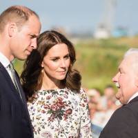 Britain’s Prince William, Duke of Cambridge (left), his wife, Kate), the Duchess of Cambridge, and former Polish President Lech Walesa talk during a wreath-laying ceremony in front of the monument for shipyard workers killed by the security and the armed forces in 1970, in Gdansk, Poland, Tuesday. Prince William, Kate visit Nazi concentration camp, Gdansk