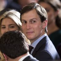 Jared Kushner and his wife, Ivanka Trump, sit in the front row in the East Room of the White House on June 5. Trump's son, son-in-law and campaign chief reportedly met with Kremlin-linked lawyer