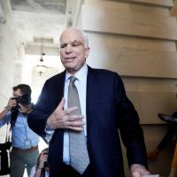 Sen. John McCain), recently diagnosed with an aggressive form of brain cancer, departs after returning to the Senate to vote on health care legislation on Capitol Hill in Washington Tuesday. Senate, with help from returning McCain, Pence, votes to debate yet-to-be-detailed GOP health care bill