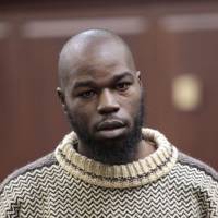 Naeem Davis faces a judge during his 2012 arraignment on murder charges in the death of a New York city subway rider who was shoved onto the tracks. On Monday, a jury acquitted Davis. Man acquitted of murder in New York City subway platform push death