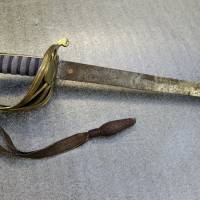 In this Friday photo taken at the Massachusetts Historical Society in Boston, the sword that belonged to Col. Robert Gould Shaw, the commanding officer of the first all-black regiment raised in the North during the Civil War, is seen. The sword, stolen after Shaw was killed during the 54th Massachusetts Voluntary Infantry’s attack on Fort Wagner, South Carolina, in 1863, was recently found in the attic of a Boston-area home. Black regiment commander's 'holy grail of Civil War swords' found