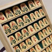 Shogi pieces inscribed with special kanji are displayed at a museum in Tendo, Yamagata Prefecture, in March 2016. Shogi boom proves boon for languishing maker of game pieces in Yamagata