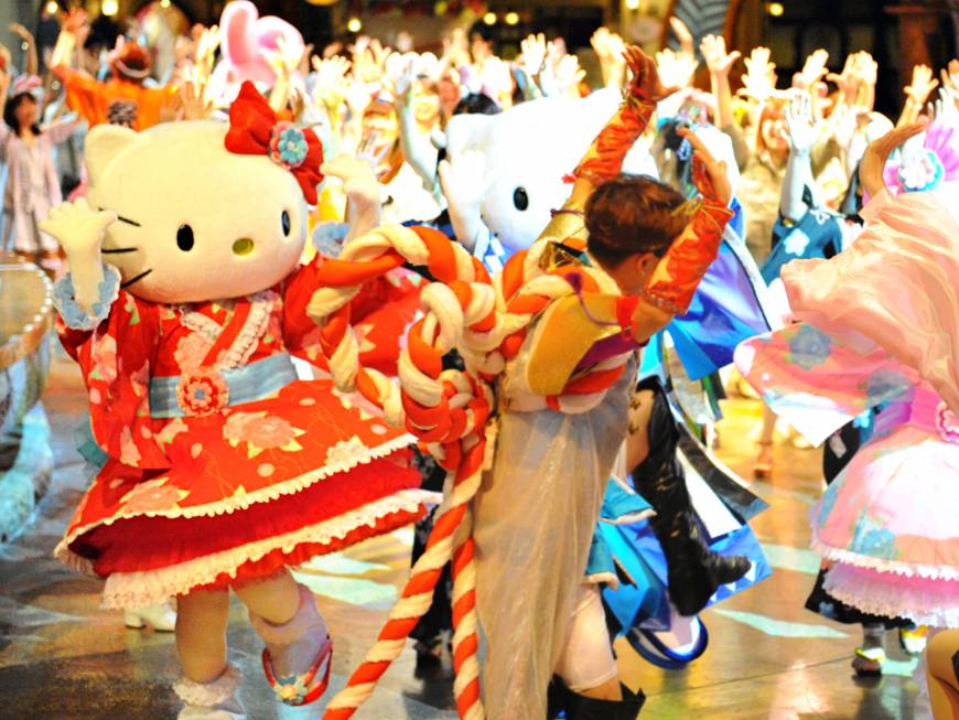 Summer Festival in Sanrio Puroland The cat's meow: Characters from Sanrio's Hello Kitty series take part in a nighttime odori (dance) at a previous Puroland festival. | ©2017 SANRIO CO., LTD.