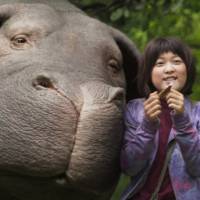 Girl’s best friend: A super pig and teenage girl share a bond in the Netflix film “Okja .” 'Okja' reminds us of friendship and factory farming