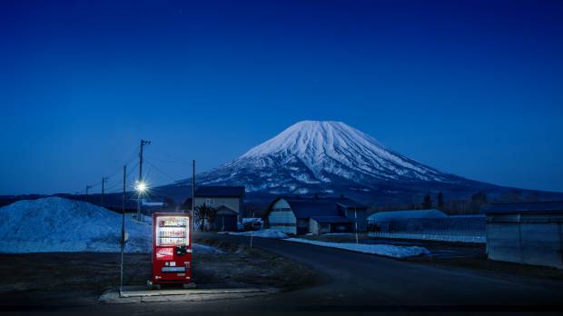 Solemn sentinel: The solitary vending machines and windswept landscapes in Eiji Ohashi’s “Roadside Lights” convey a world in which the individual increasingly stands alone. 'Roadside Lights': Capturing Japan through its lonely vending machines