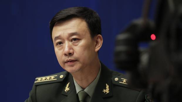 Chinese defense ministry spokesman Wu Qian speaks at a news conference in Beijing on Monday. China is warning India not to underestimate its determination to safeguard what it considers sovereign territory amid a standoff over a contested region in the Himalayas. What China's Himalayan warmongering reveals