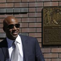 Former San Francisco Giants star Barry Bonds smiles before speaking at his Wall of Fame induction ceremony on Saturday in San Francisco. Bonds given plaque on Giants' Wall of Fame