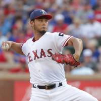 Yu Darvish pitches during the Rangers’ game against the Red Sox on July 4 in Arlington, Texas. Darvish pulls out of All-Star Game