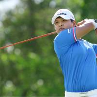 Harukyo Nomura hits a shot during the third round of the U.S. Women’s Open on Saturday in Bedminster, New Jersey. Feng leads U.S. Women's Open as Trump watches; Nomura in 10th place