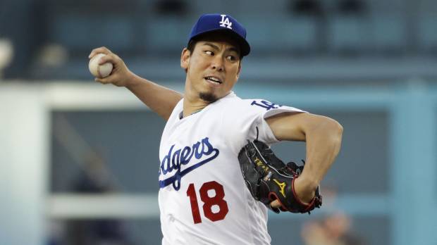 Dodgers starter Kenta Maeda pitches against the Twins on Tuesday at Dodger Stadium in Los Angeles. The Dodgers won 6-2. Maeda's solid outing helps Dodgers top Twins