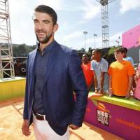 Michael Phelps U.S. swim team eagerly awaits Phelps' televised race against shark