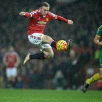 Wayne Rooney, seen playing for Manchester United in a Premier League match against Norwich City in December 2015, scored 253 goals, a club record, in his 13 years with United. Rooney returns to Everton after 13 years at Manchester United