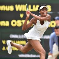 Venus Williams hits a return against Jelena Ostapenko during their quarterfinal match at Wimbledon on Tuesday. Past, not crowd, favors Williams against Konta at Wimbledon