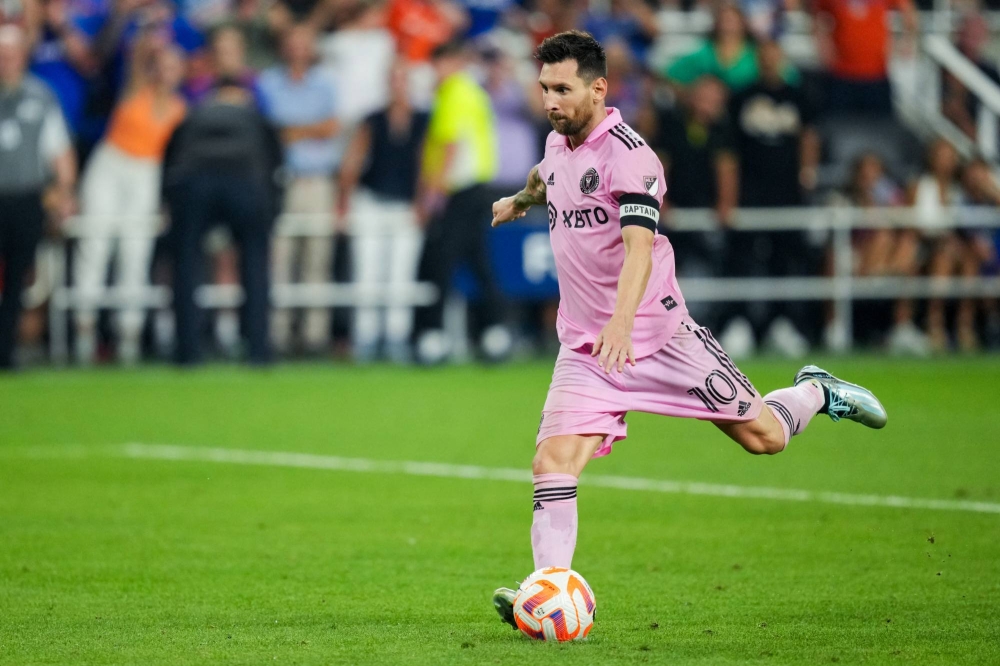 Messi Kicking A Soccer Ball