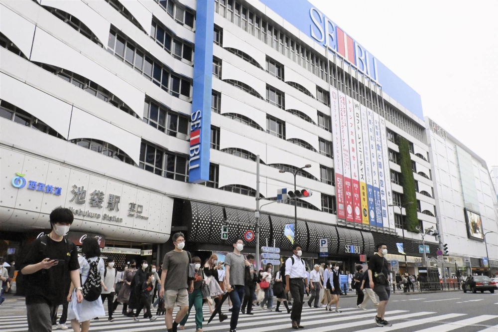 Workers stage Japan's first strike in decades over department store sale