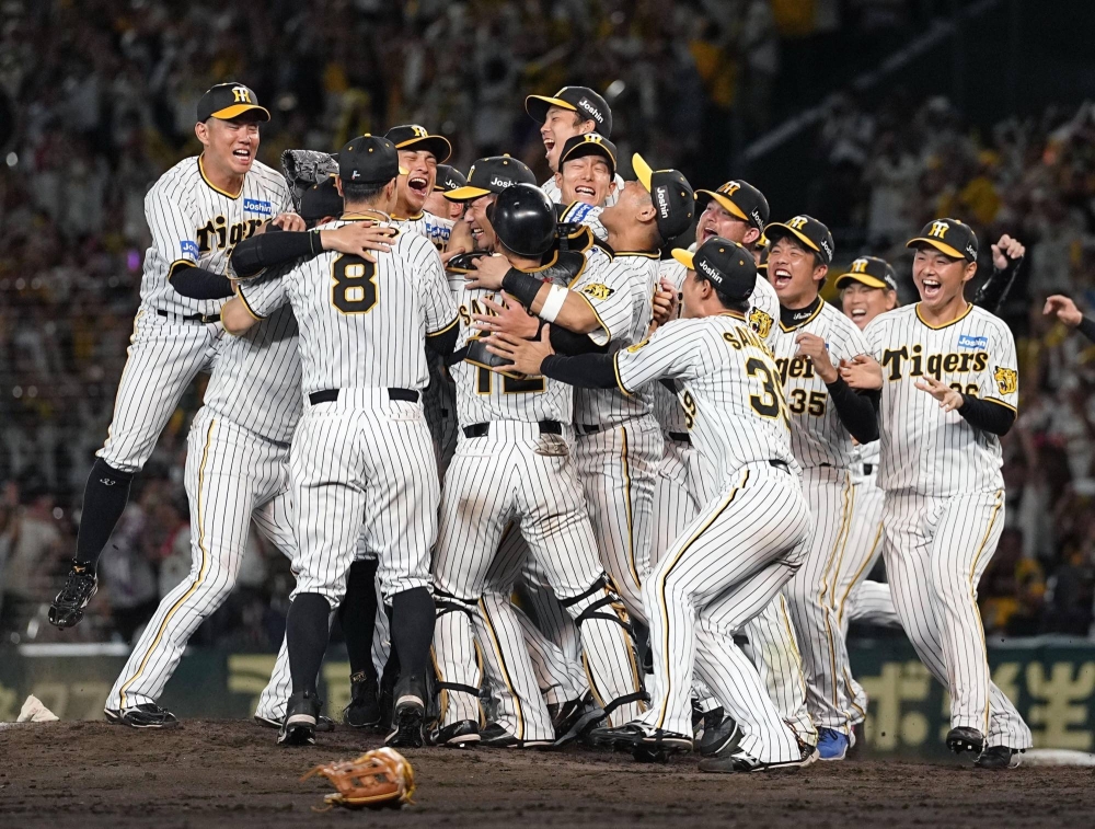 In Photos: Hanshin Tigers, fans celebrate winning Central League