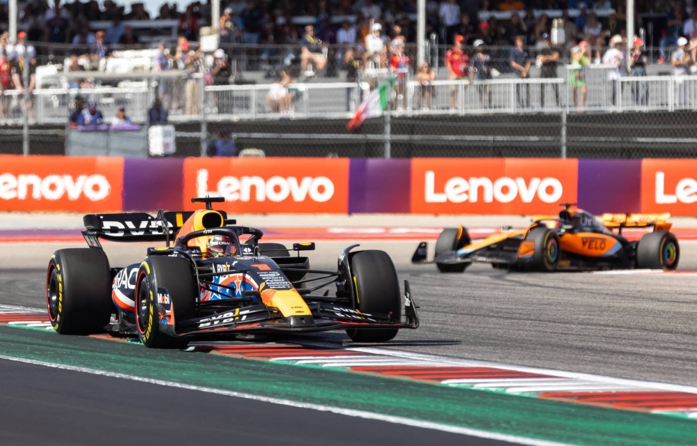 Lando Norris in the background follows Max Verstappen at the United States Grand Prix in Austin, Texas.