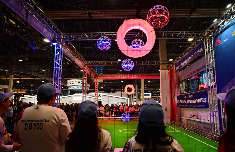 Buzz, bump, goal! Drone soccer aims high at CES - The Japan Times