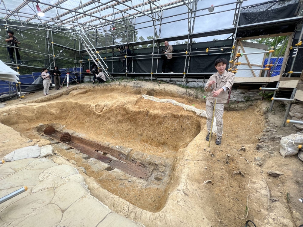 From the outside, the Tomio Maruyama burial mound in the city of Nara is unimpressive — the fenced-off property dotted with tree stumps, weeds and p