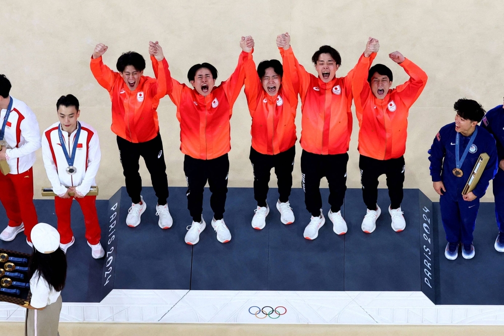 How Japan's gymnasts picked each other up and toppled China