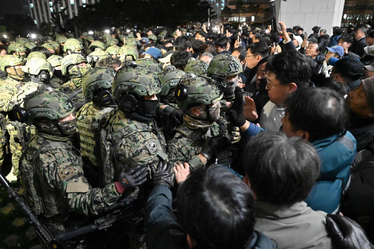 South Korea’s Yoon backs down after parliament rejects martial law