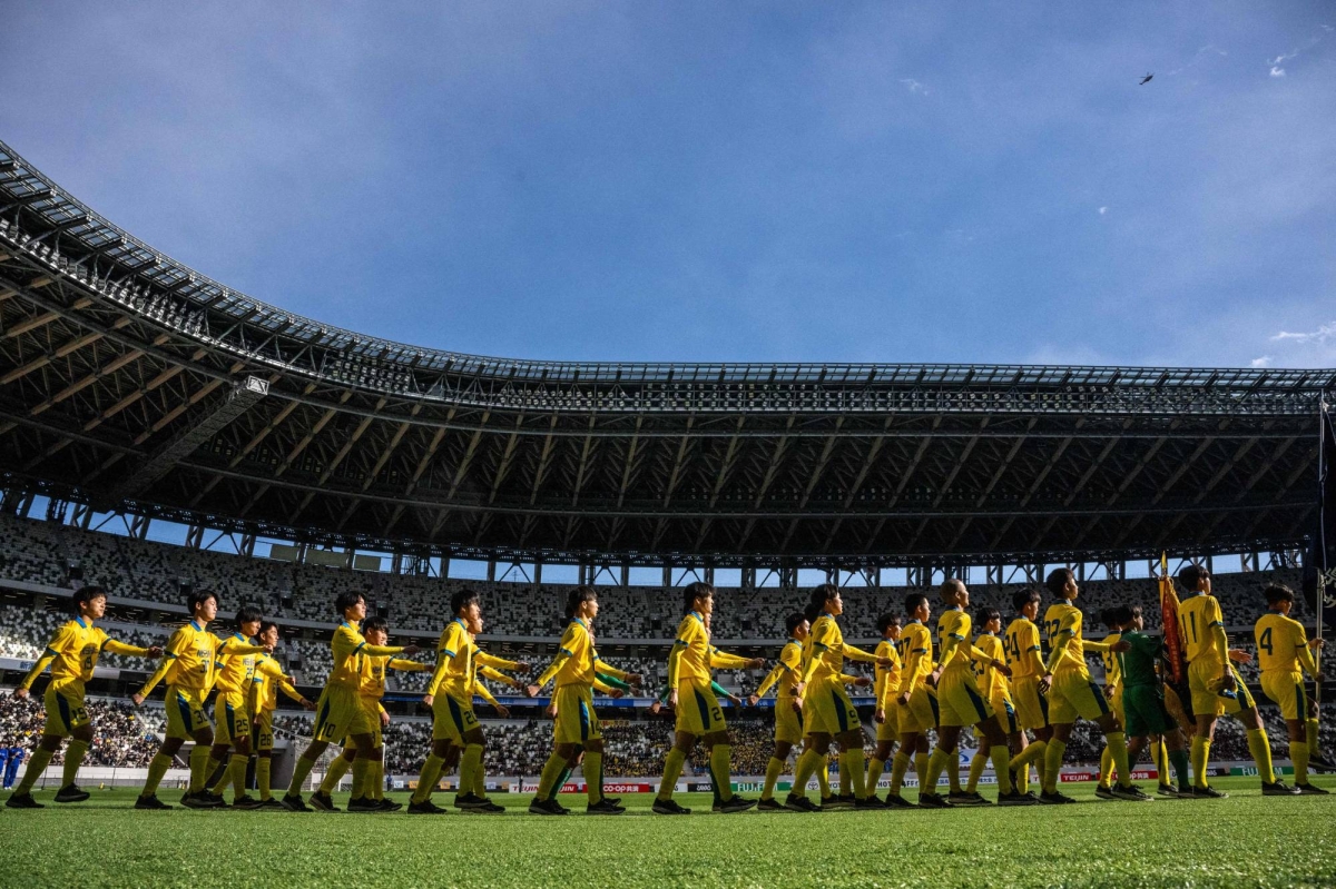 Japan's school soccer tournament fosters future talent amidst drama and dreams.