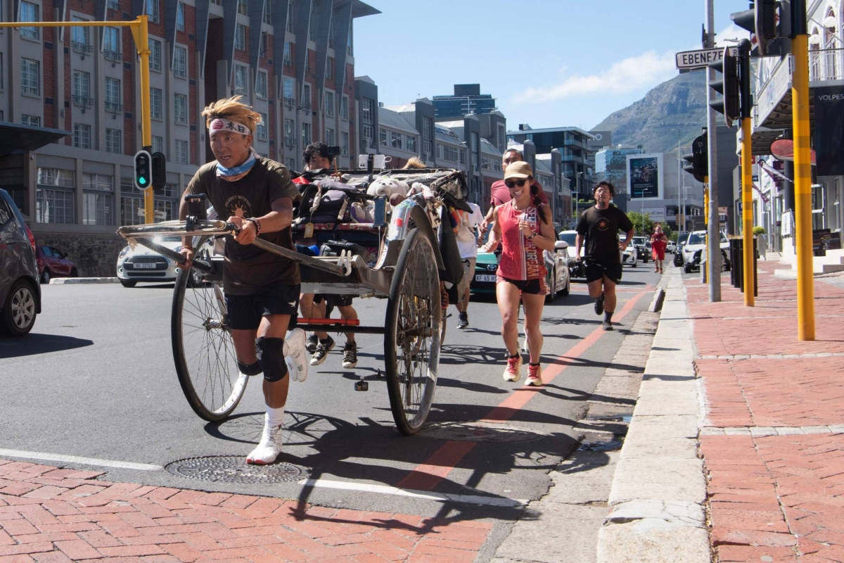 Japanese man completes 6,000 km rickshaw journey across Africa, ending in Cape Town.