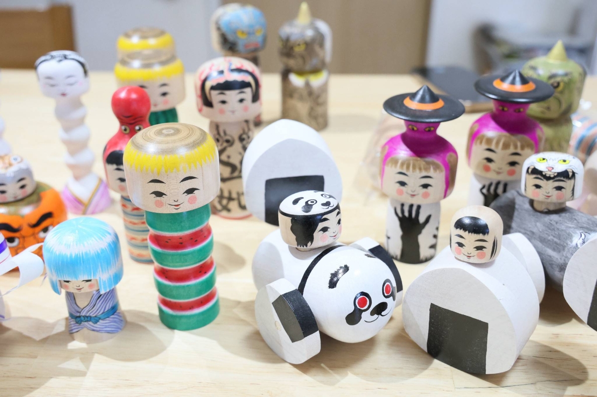 Ishinomaki craftsman promotes hometown with unique wooden dolls after 3/11