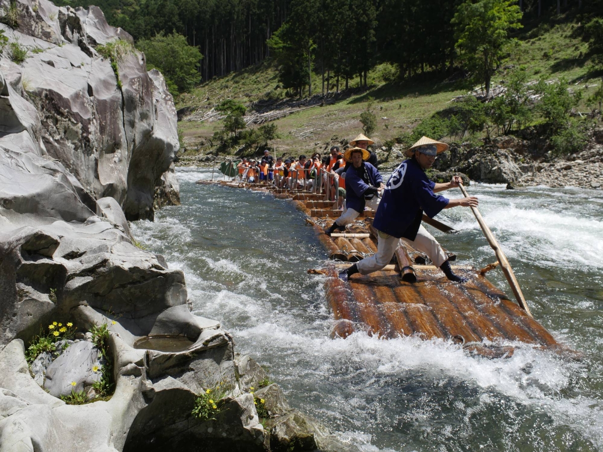 A tiny mountain hamlet keeps traditional log rafting afloat