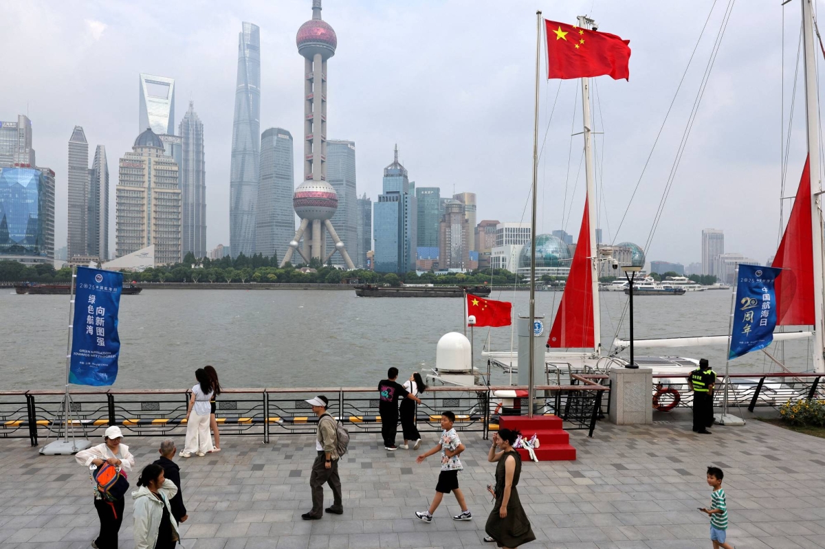 Beneath China's resilient economy, a life of pay cuts and side hustles