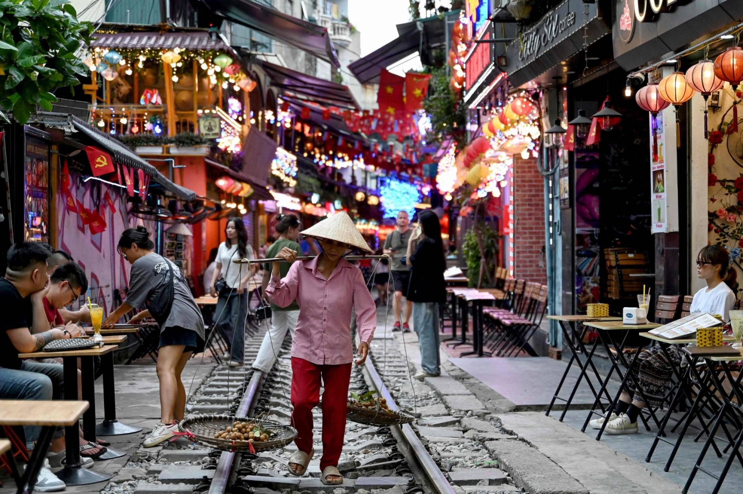 Tourists dodge danger on Hanoi's train street