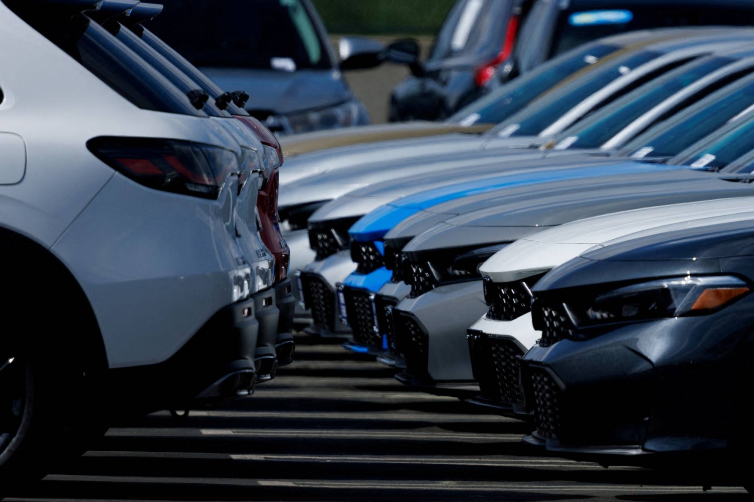 Japanese automakers warn of billions in tariff losses