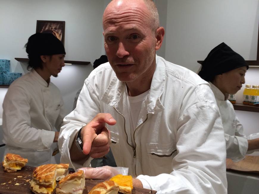 Artisan baker Christophe Vasseur presents his creations at the opening of Rituel Par Christophe Vasseur in Jiyugaoka, Tokyo.