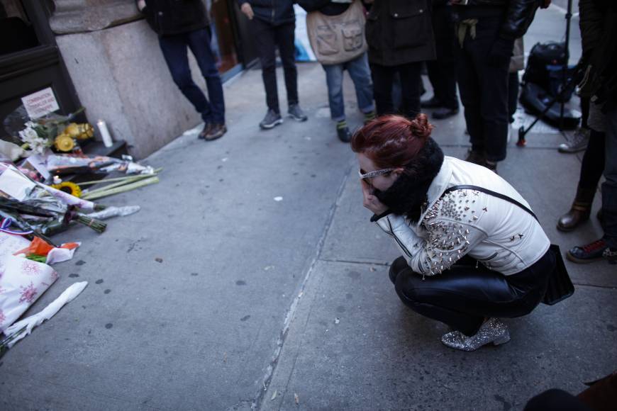 Fans in New York also commemorate the icon at a makeshift memorial outside his New York apartment building on Jan. 11.