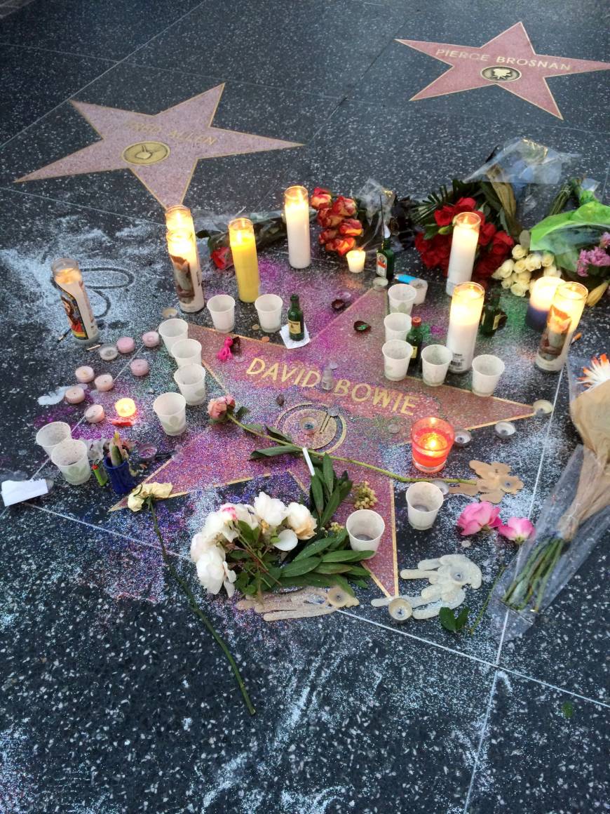 Fans in Los Angeles leave tributes by his star on the Hollywood Walk of Fame on Monday.