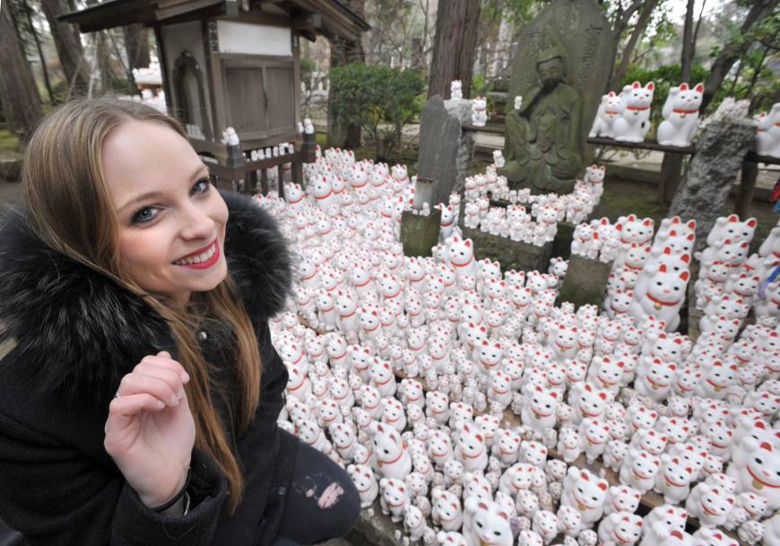 French tourist Camille Peiret, 19, visits Gotokuji Temple in Tokyo