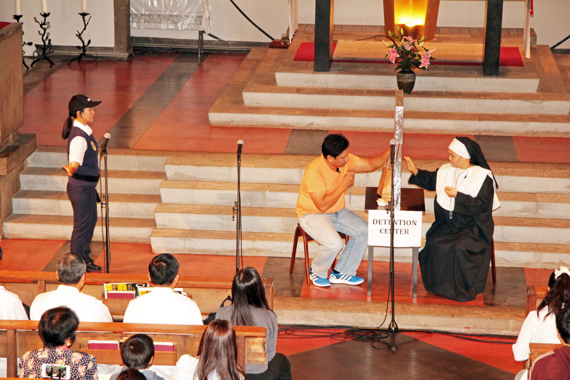Congregants act out a skit based in a Japanese immigration detention center at this year