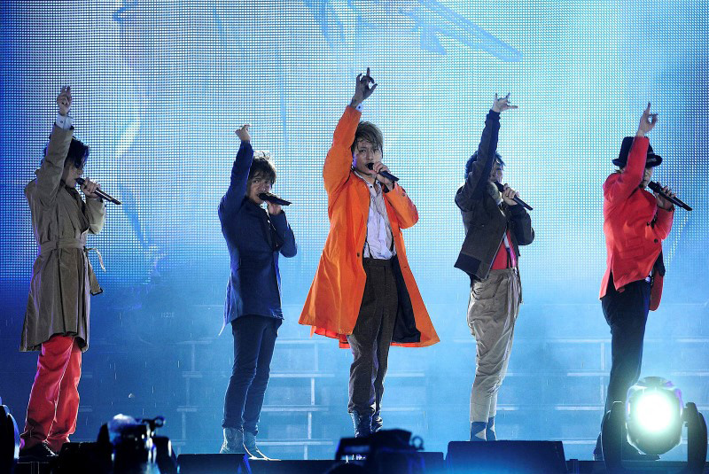 Members of the all-male pop group SMAP perform at a September 2011 concert in Beijing. 