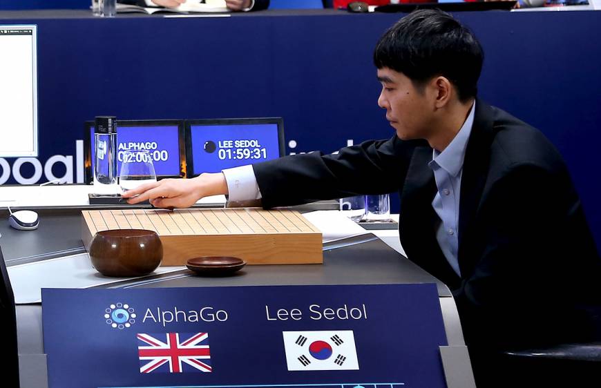 Lee Sedol makes the first move in a game against AlphaGo in April.