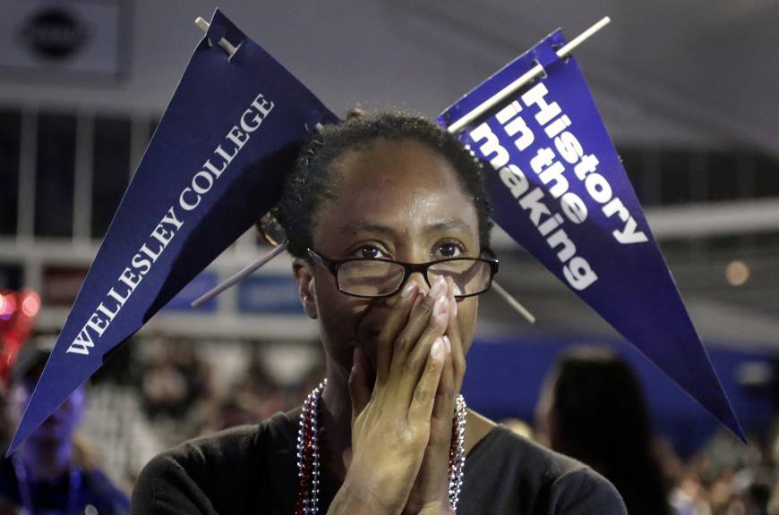 A Clinton supporter in Newton, Mass., watches televised election returns during a viewing party on Cinton