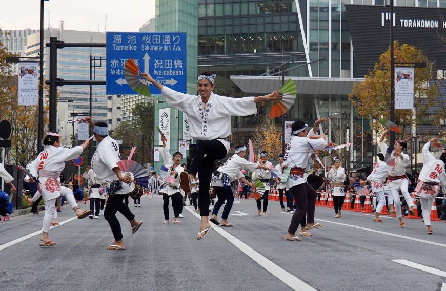 Dancers take to the air during a performance of Sendai Suzume Odori.