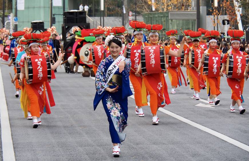 Women perform a sample of the the Sansa Odori. The actual festival, however, features 10,000 dancers and drummers, which puts it in the Guinness Book of World Records for being the largest taiko festival in the world.