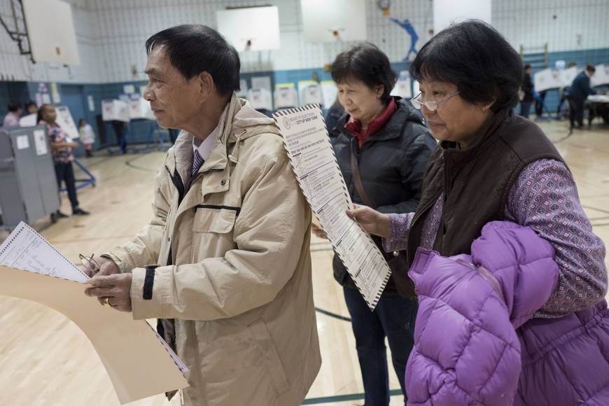 Voters wait to cast their ballots in Brooklyn, New York.