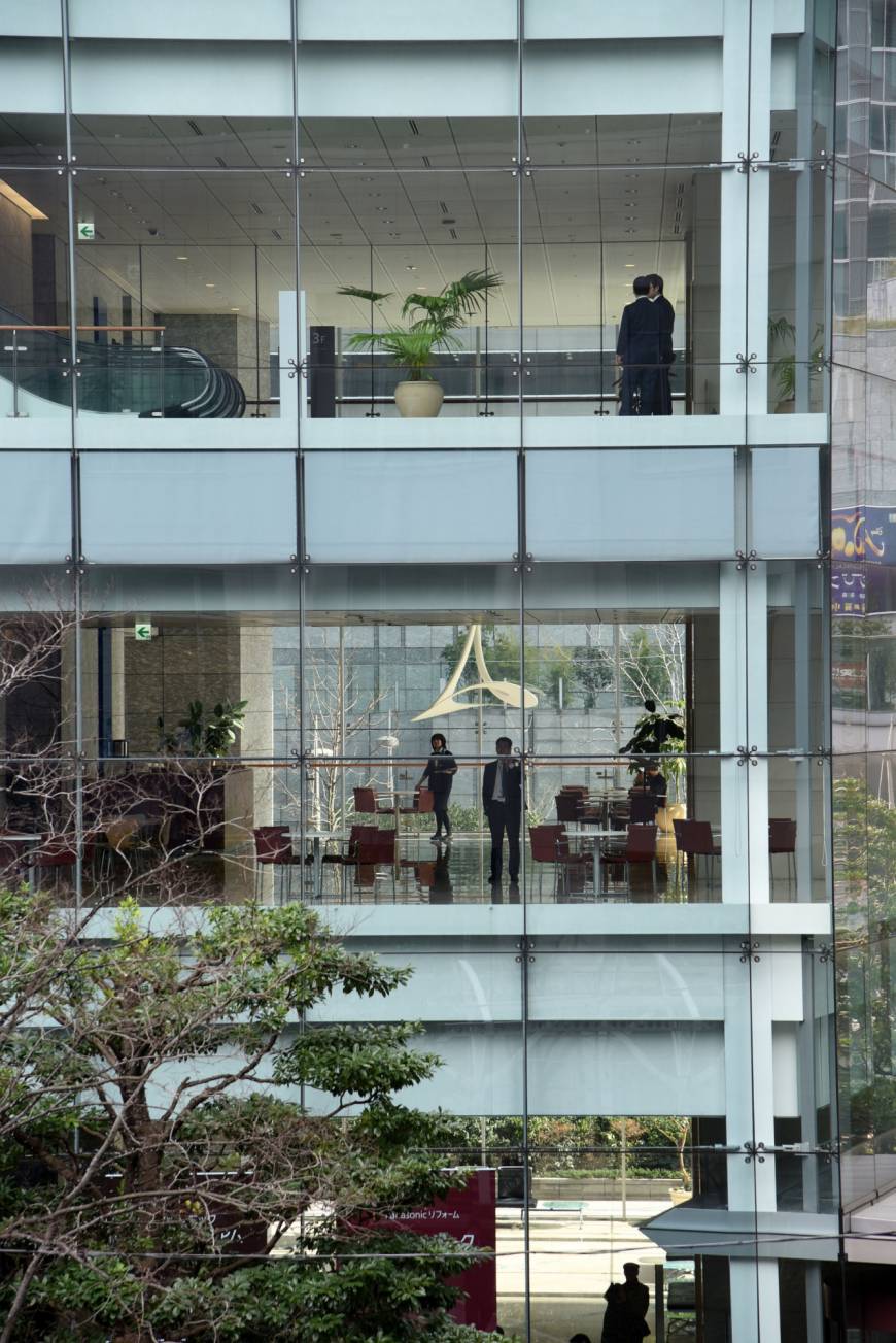 People work in a skyscraper in the Shiodome district in Minato Ward, Tokyo, on Feb. 20.