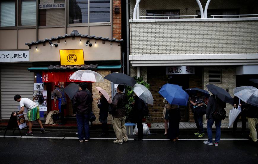 People line up Sunday in front of Ramen Nagi in Tokyo for a one-day event that featured 