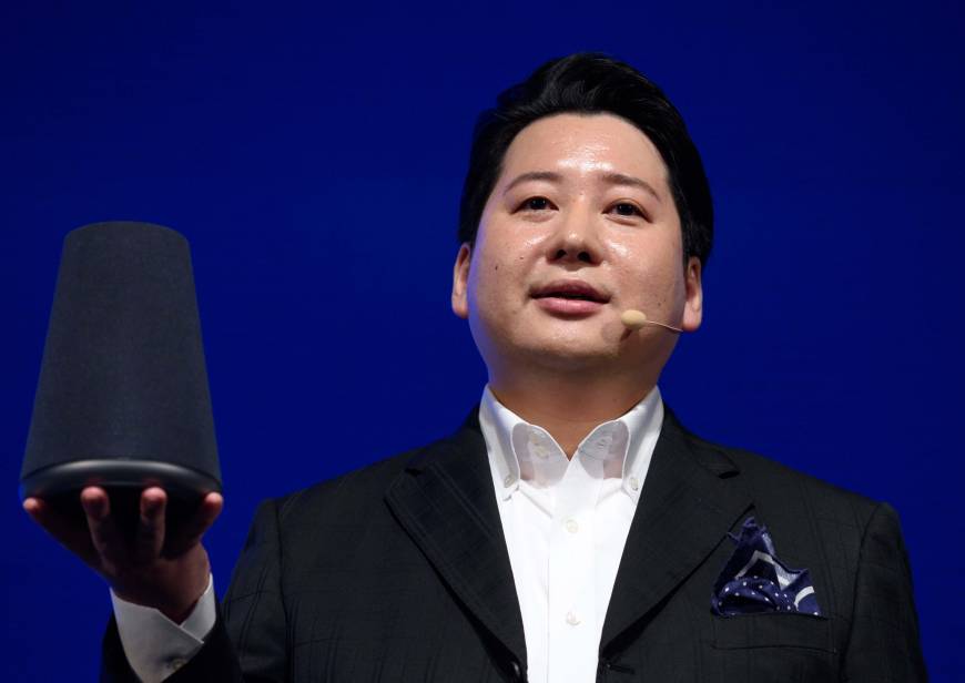 Jun Masuda, chief strategy and marketing officer of Line Corp., holds the company