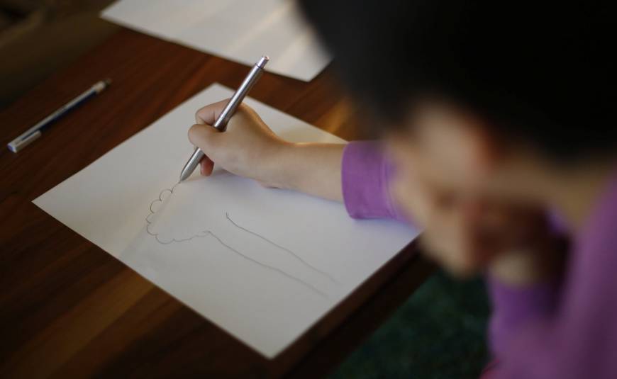 A nine-year-old girl who spent more than three months in a temporary shelter in Tokyo is pictured at her psychotherapist