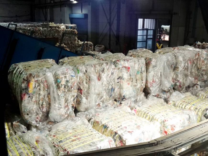 Plastic bales are stacked at the Showa Denko Kawasaki plant.